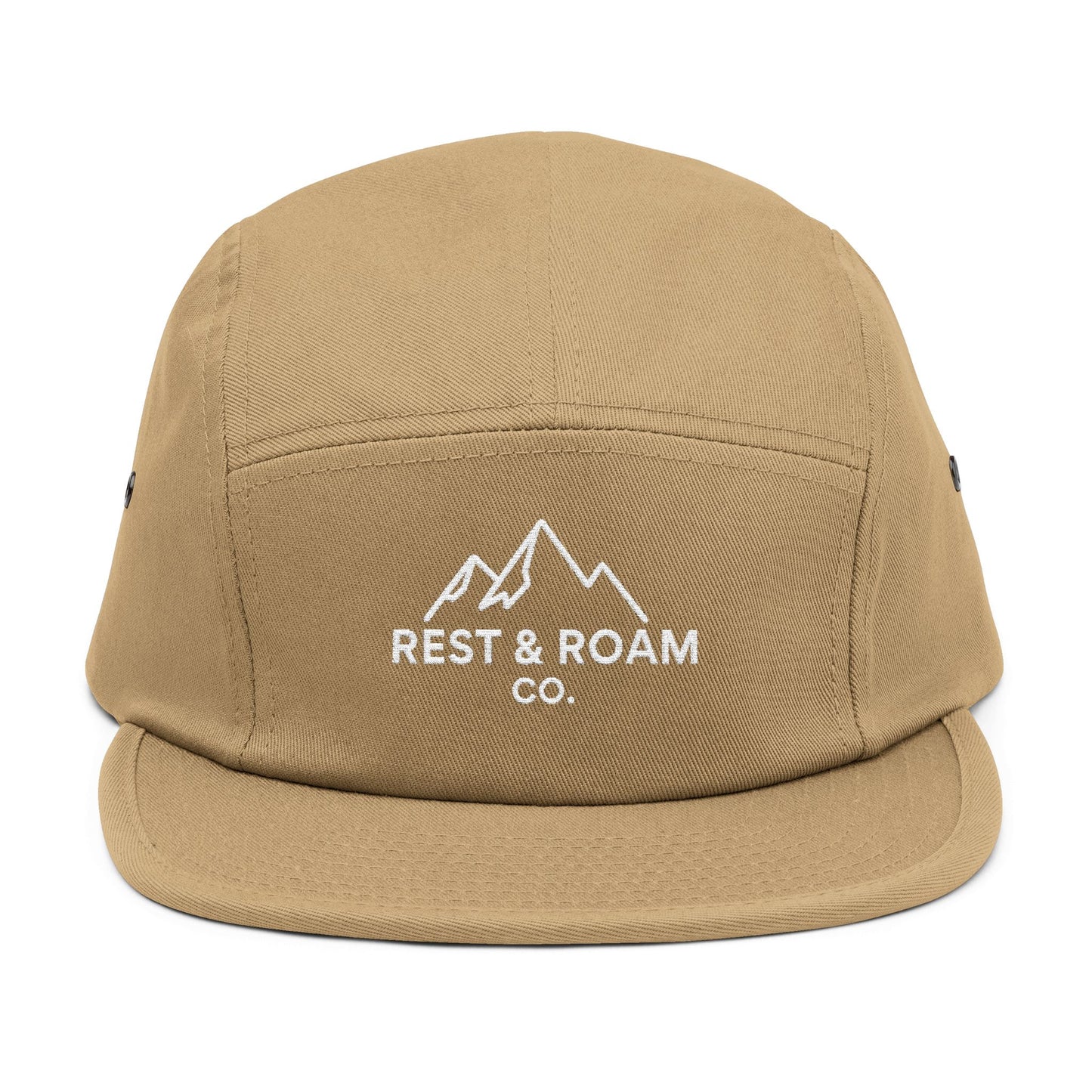 Close-up of an olive embroidered 5-panel camp hat with Rest & Roam Co. mountain logo on front panel