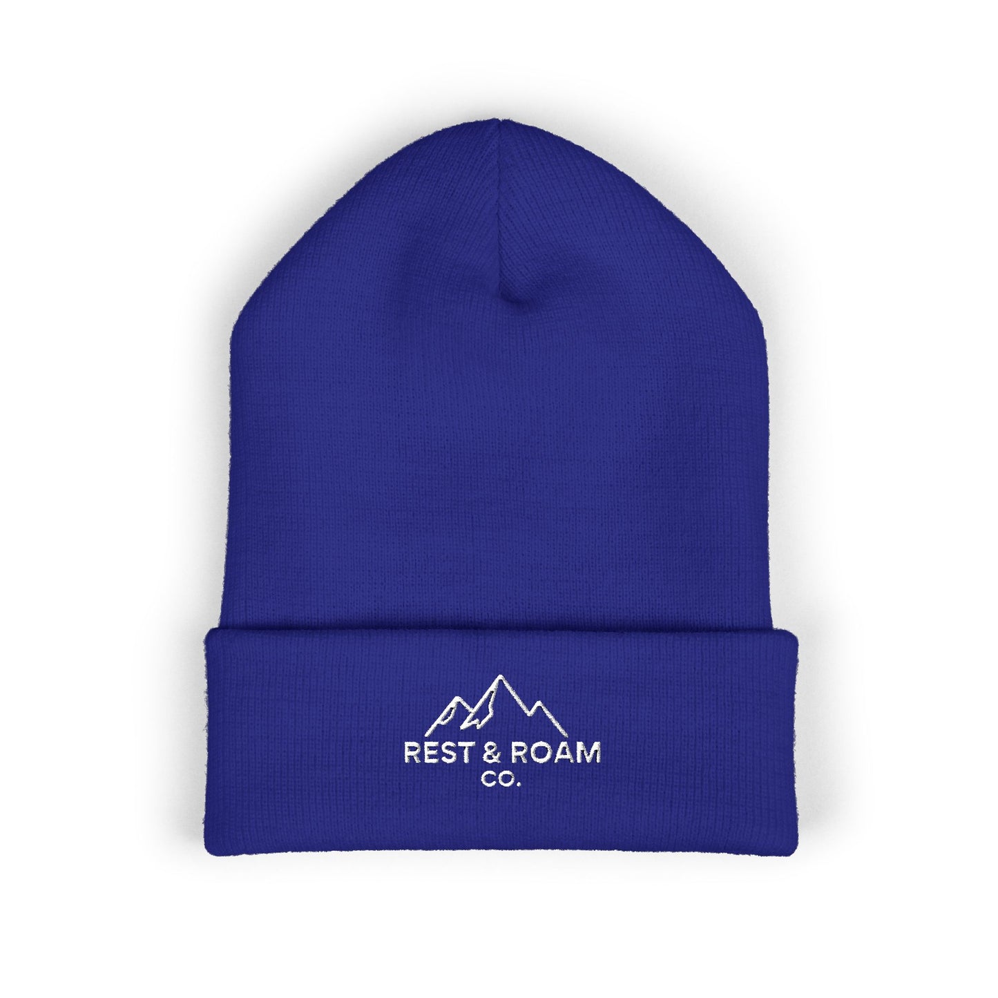 Blue beanie with 'Rest & Roam Co.' logo on a white background