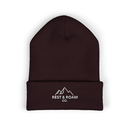 Brown beanie with 'Rest & Roam Co.' logo on a white background