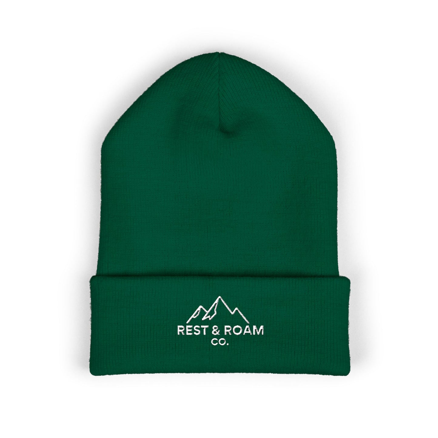 Green beanie with 'Rest & Roam Co.' logo on a white background