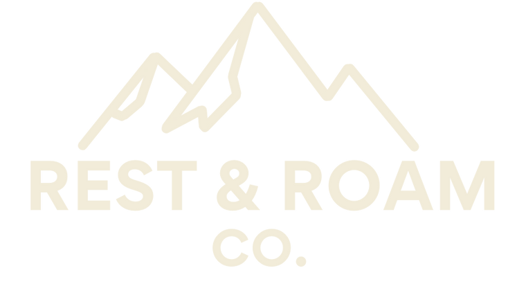 Rest & Roam Co. outdoor lifestyle apparel logo with cream font on a clear background.