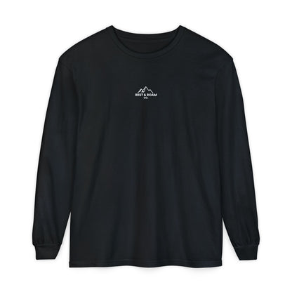 Black colored Rest & Roam Co. long sleeve shirt (The Foxy), with Rest & Roam Co. white mountain logo placed on a white background. 
