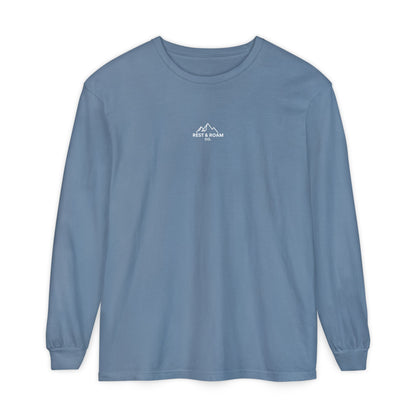 Ice Blue colored Rest & Roam Co. long sleeve shirt (The Foxy), with Rest & Roam Co. white mountain logo placed on a white background. 