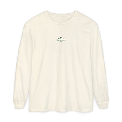 Ivory colored Rest & Roam Co. long sleeve shirt (The Foxy), with Rest & Roam Co. white mountain logo placed on a white background. 