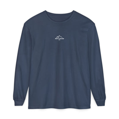 Navy colored Rest & Roam Co. long sleeve shirt (The Foxy), with Rest & Roam Co. white mountain logo placed on a white background. 